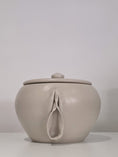 Load image into Gallery viewer, Common Genetics, a wide lidded jar, front view
