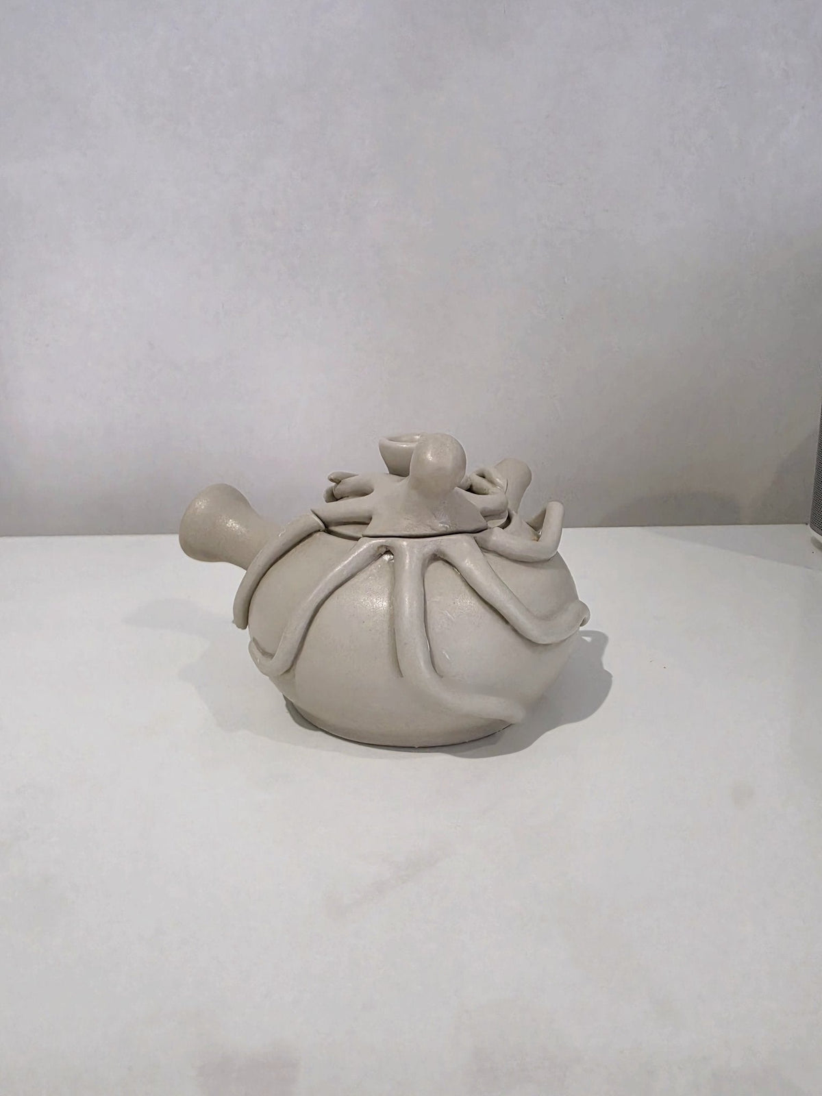 The Kyusu Pussy, an octopus kyusu teapot, from the back