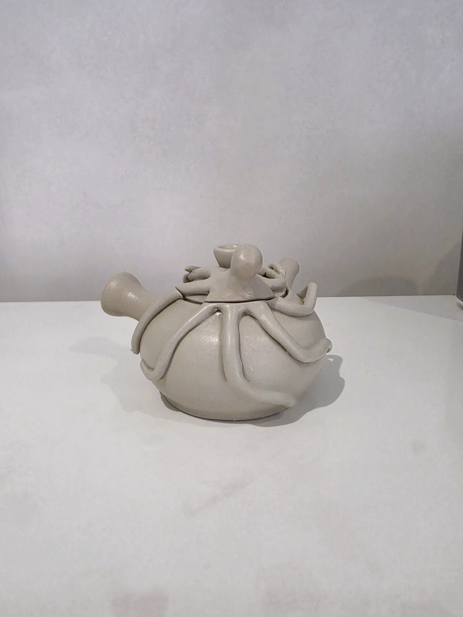 The Kyusu Pussy, an octopus kyusu teapot, from the back