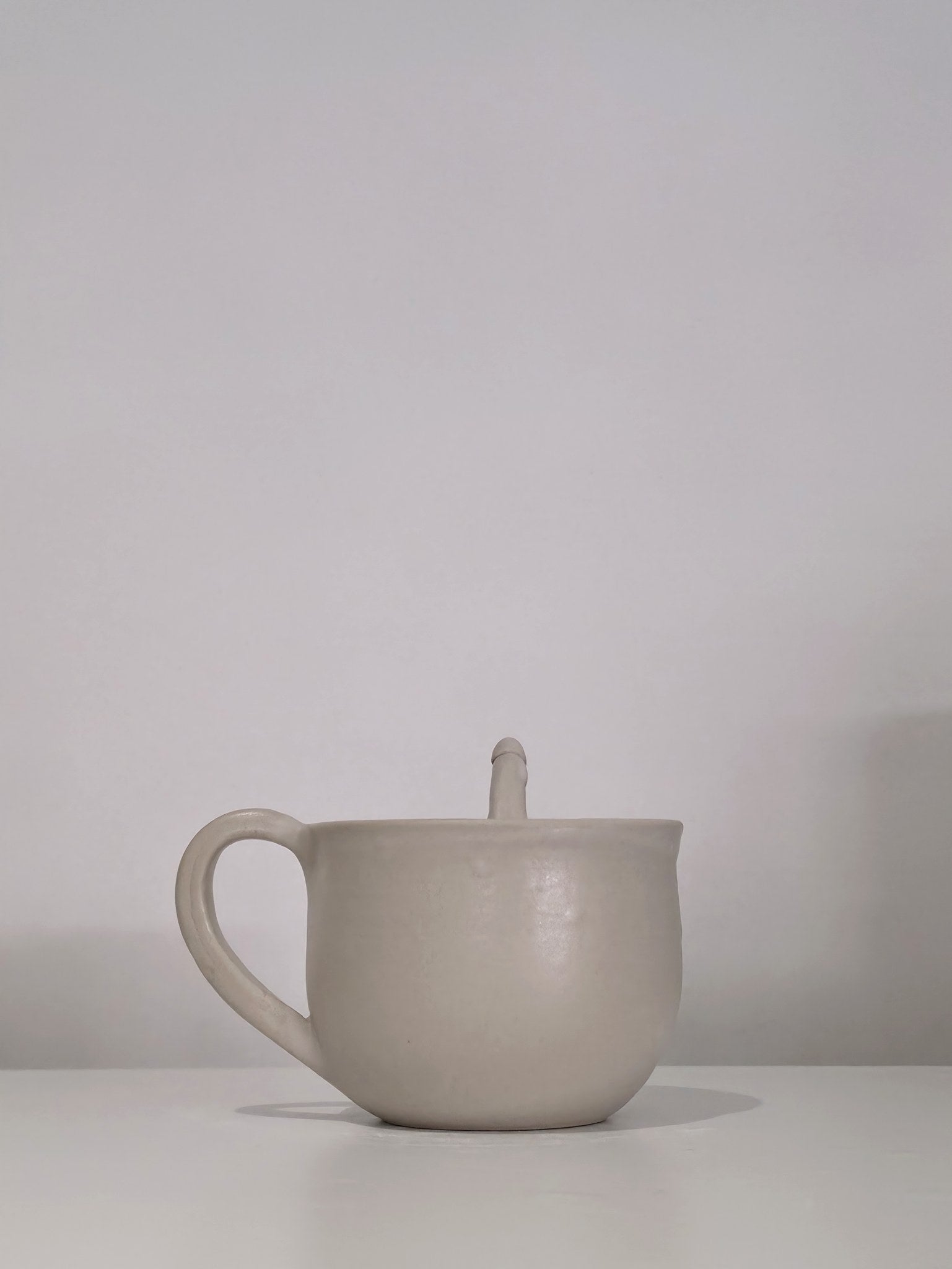 The Penis Cup, handmade ceramic cup, side view 3