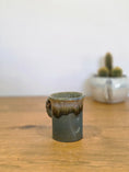 Load image into Gallery viewer, Anal thumb coffee cup, side, from the right
