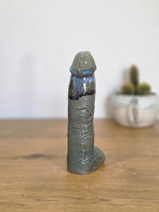 Sculpture, blue and grey over dark grey, front, straight on