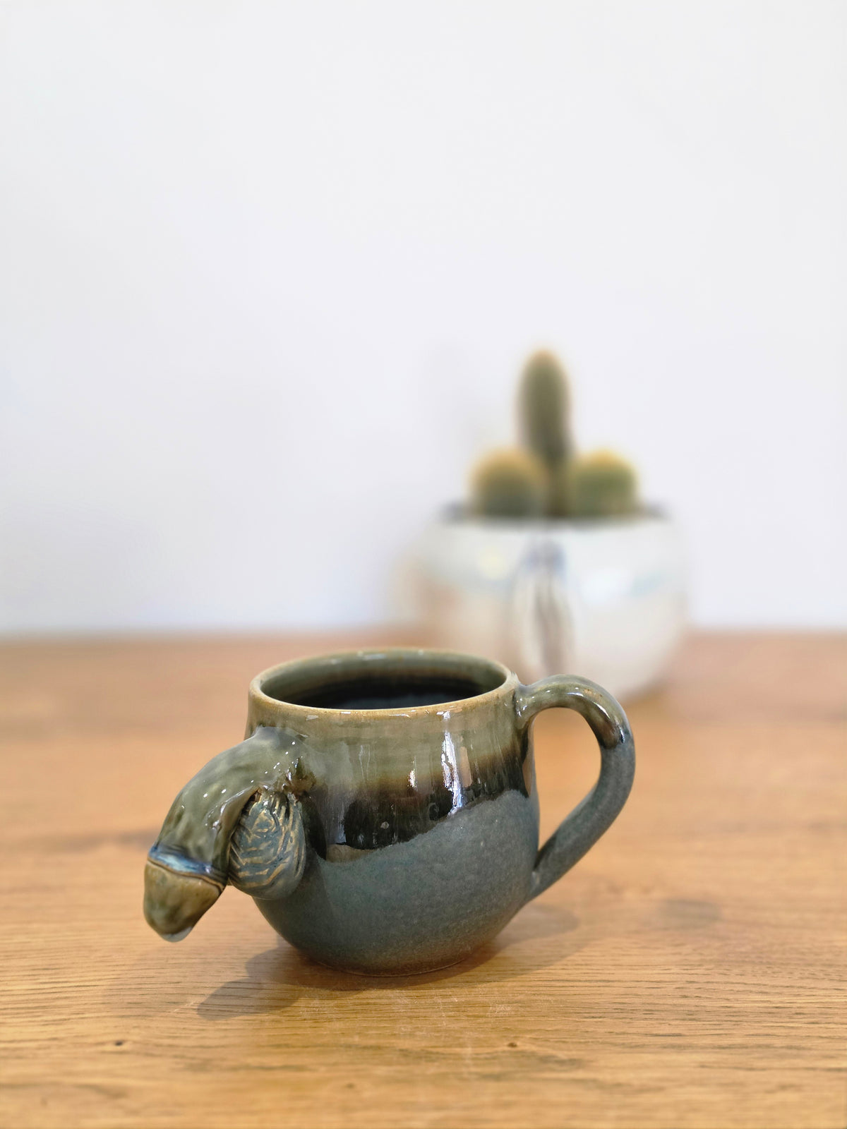 Dave Tea Dick, side, handle and sculpt in view