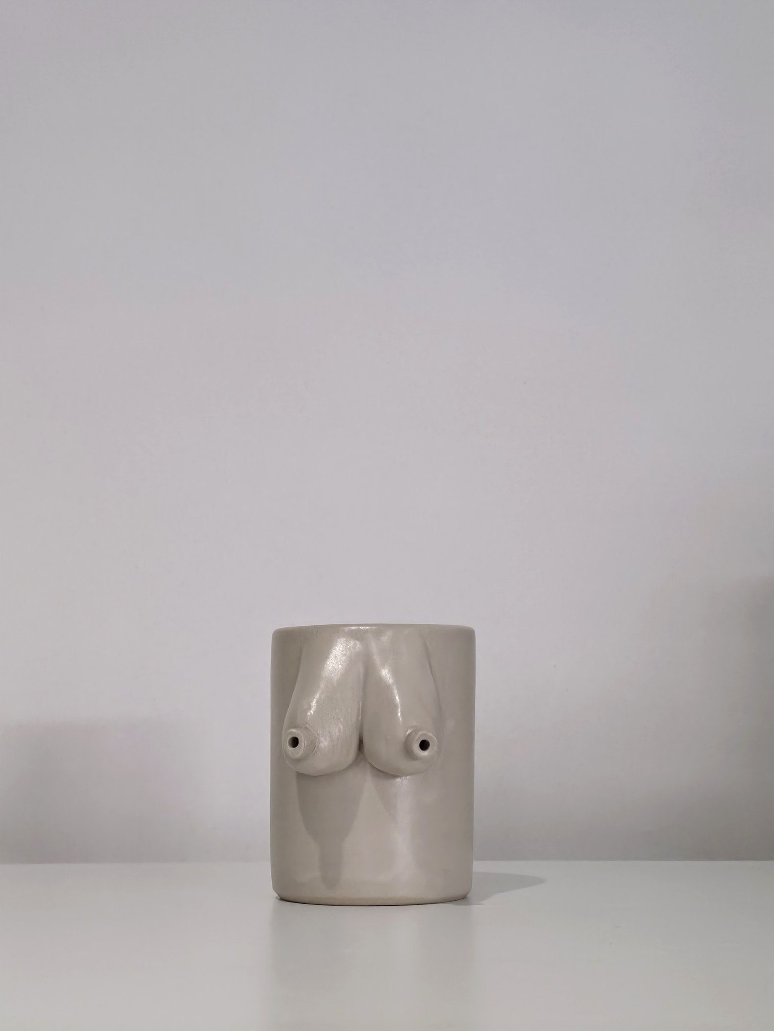 The Titty Can, handmade ceramic can, front view