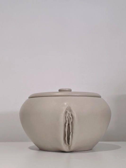 The Vulva Jar, handmade lidded ceramic jar, front view with lid